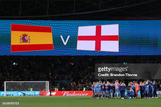 England players celebrate in the huddle while the screen displays the final's fixture after the FIFA Women's World Cup Australia & New Zealand 2023...