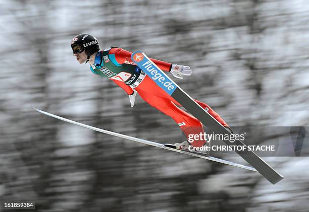 Norway's Anders Jacobsen jumps during the FIS Ski Jumping World Cup team flying competition in Oberstdorf, southern Germany, on February 17, 2013....