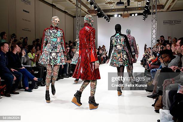 Models walk the runway at the Dans la Vie show during London Fashion Week Fall/Winter 2013/14 at Freemasons Hall on February 16, 2013 in London,...