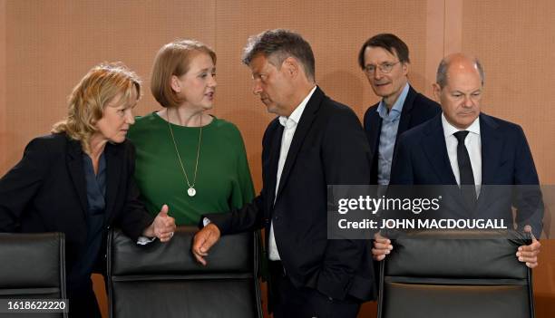 German Chancellor Olaf Scholz takes his seat as German Minister for the Environment, Nature Conservation, Nuclear Safety and Consumer Protection...