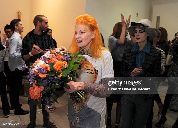 Dame Vivienne Westwood attends the Vivienne Westwood Red Label show during London Fashion Week Fall/Winter 2013/14 at the Saatchi Gallery on February...