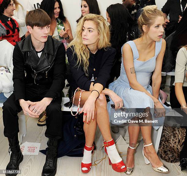 Luke Worrall, Chelsea Leyland and Peaches Geldof attend the Vivienne Westwood Red Label show during London Fashion Week Fall/Winter 2013/14 at the...