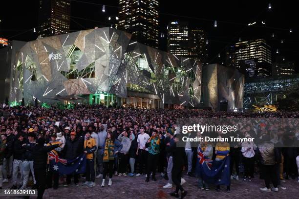 Fans at Federation Square watch the Matildas FIFA World Cup Semi Final Game, on August 16, 2023 in Melbourne, Australia.