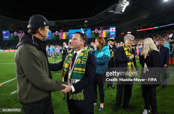 Tony Gustavsson, Head Coach of Australia, talks with James Johnson, Football Australia CEO after the FIFA Women's World Cup Australia & New Zealand...