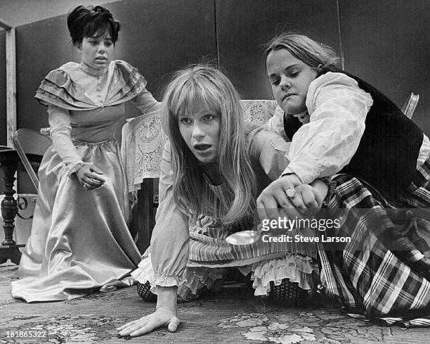 Helen Keller, center, is restricted in scene from "Miracle Worker"; Mrs. Keller, left, played by Brenda Burke, looks on while Annie Sullivan, Claudia...