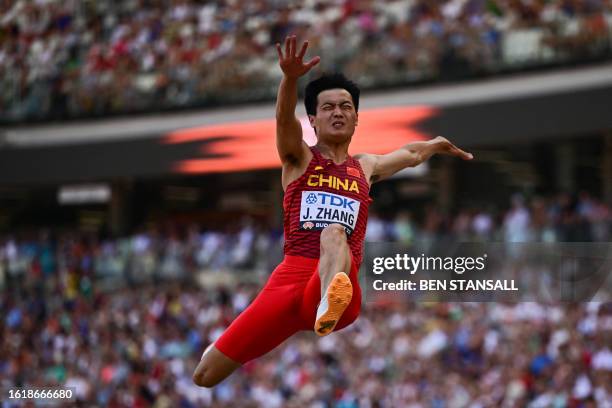 China's Zhang Mingkun competes in the men's long jump qualification during the World Athletics Championships at the National Athletics Centre in...