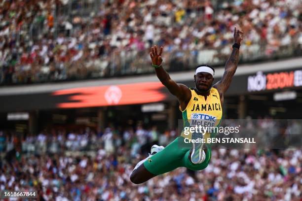 Jamaica's Carey Mcleod competes in the men's long jump qualification during the World Athletics Championships at the National Athletics Centre in...