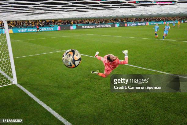 Mary Earps of England dives in vain as Sam Kerr of Australia scores her team's first goal during the FIFA Women's World Cup Australia & New Zealand...