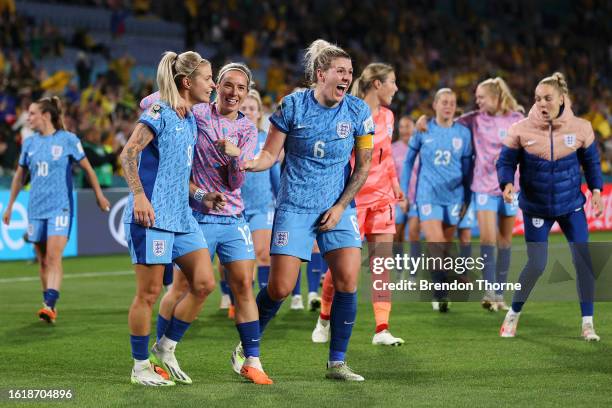 Lauren James of England celebrates victory with teammates Jordan Nobbs and Millie Bright after defeating Australia during the FIFA Women's World Cup...