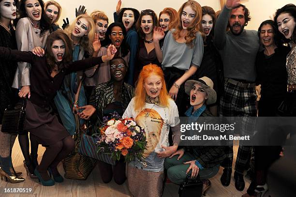 Dame Vivienne Westwood and Andreas Kronthaler attend the Vivienne Westwood Red Label show during London Fashion Week Fall/Winter 2013/14 at the...