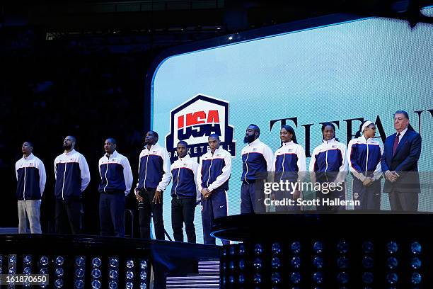 Members of USA basketball including USA Basketball president Jerry Colangelo stand on the stage before the Taco Bell Skills Challenge part of 2013...