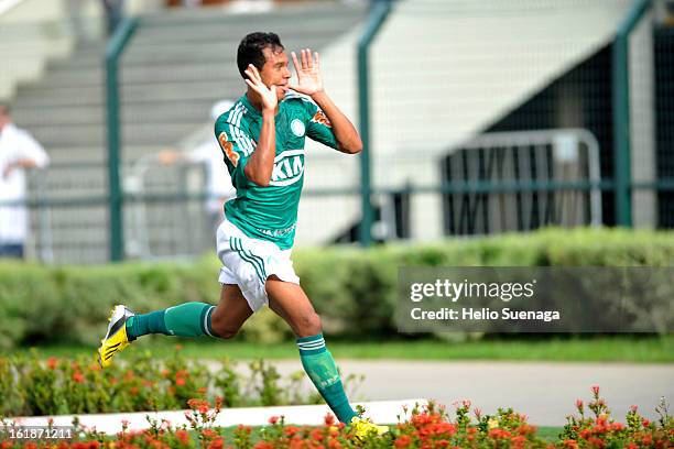 Vinicius of Palmeiras celebrates a goal against Corinthians during a match between Corinthians and Palmeiras as part of Paulista championship 2013 at...