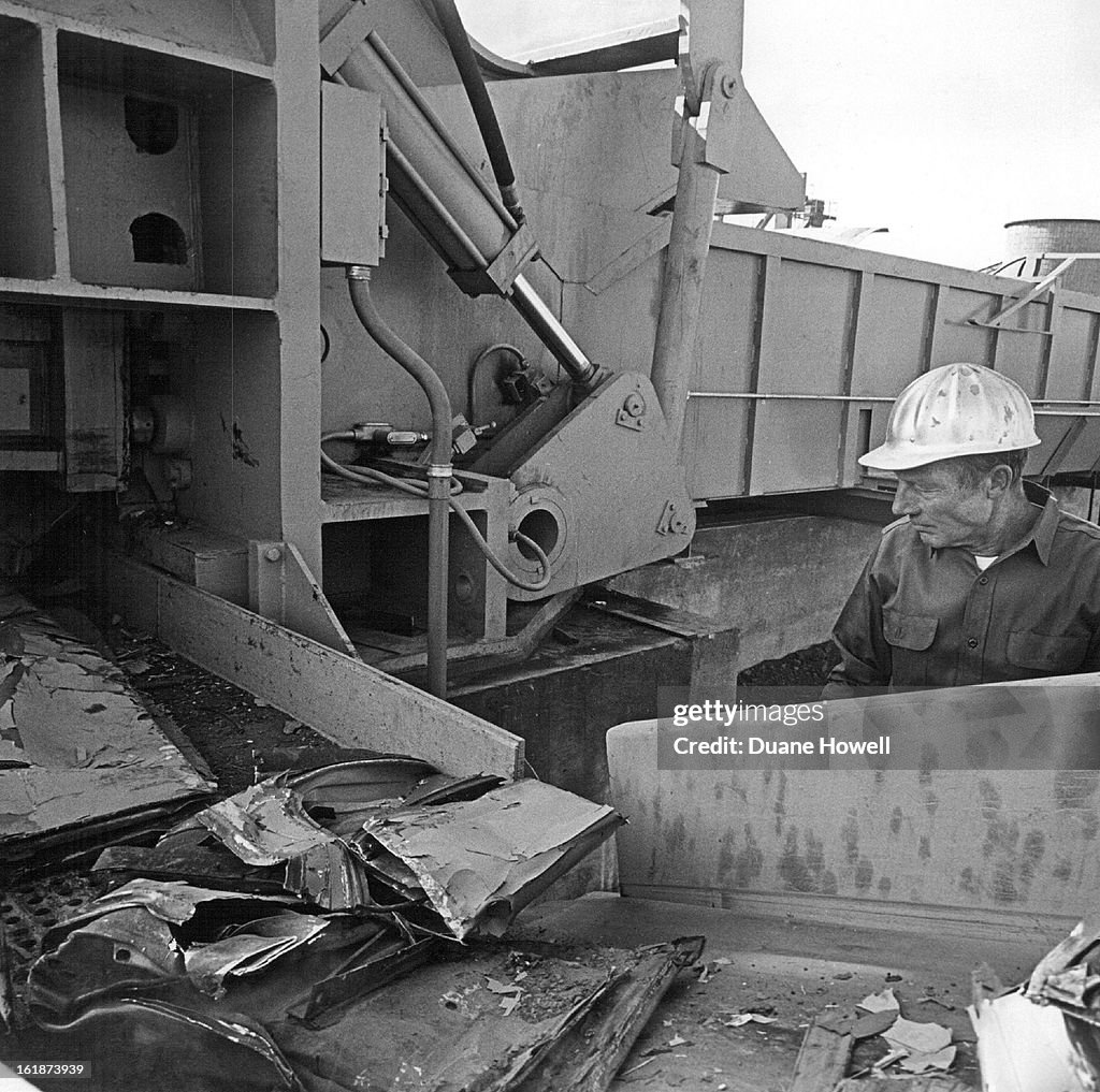 NOV 8 1968, NOV 12 1968; Steel slabs and fragments that moments earlier were shell of an old car mov