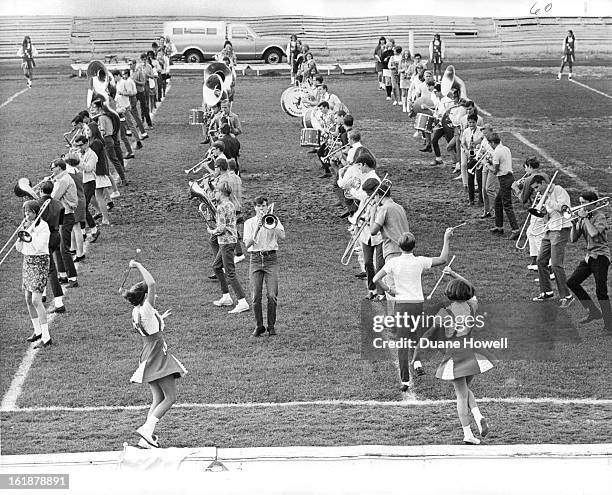 Westminster Bands Practice Hard; In upper photo you might think the Westminster High School band majorettes are jumping to commands of Allen Mixon,...