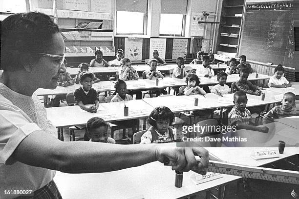 Mrs. Elizabeth Ward has first- grade class at Whittier School, E. 24th Ave. And Marion St. There is only one non-Negro pupil. This nearly complete...