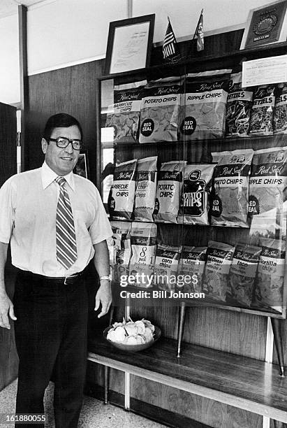 Earl Wilson, owner and president of Red Seal, stands beside display of some of the company's products. Wilson's father, Milo, started business in...