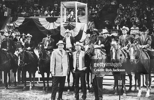 Eight 1968 Champions Of The Rodeo Cowboys Association Receive Ovation After Being Introduced At National Western Rodeo Thursday Night; Standing in...