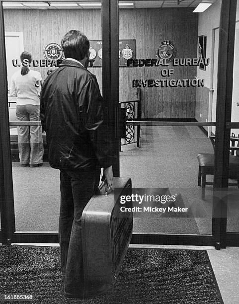The Beginning of A New Ordeal; Mike arrives at Denver office of FBI to turn himself in.;