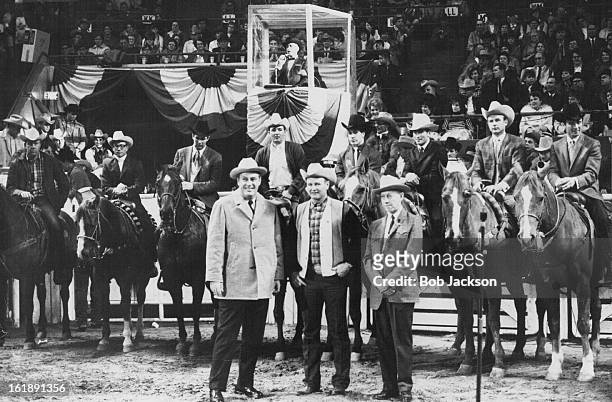 Eight 1968 Champions of the Rodeo Cowboys Association Receive Ovation After Being Introduced At National Western Rodeo Thursday Night; Standing in...