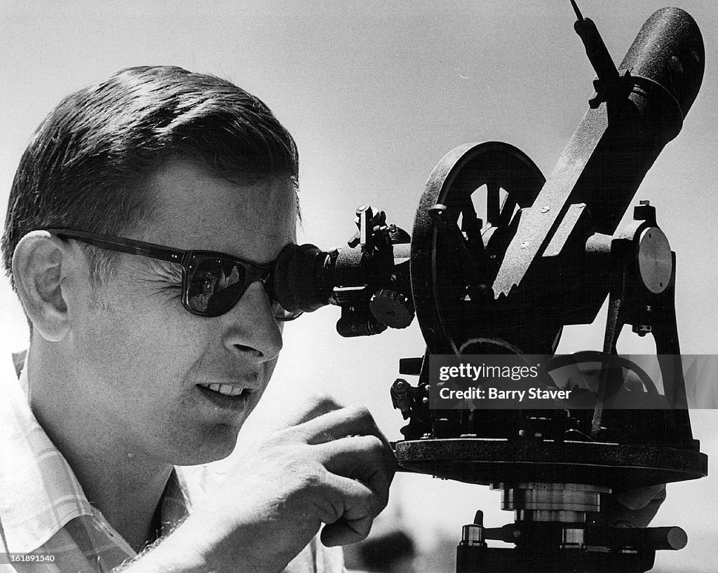 MAY 13 1971, MAY 21 1971, MAY 22 1971; Jim Robinette reads theodolite which tracks weather balloon a