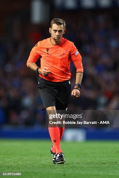 Official UEFA Referee, Clément Turpin of France during the UEFA Champions Qualifying Play-Off First Leg match between Rangers and PSV Eindhoven at...