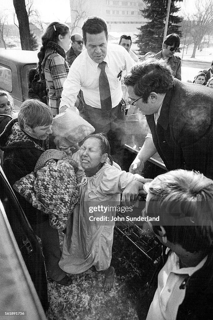 1-14-1979, JAN 16 1979; Ciria Gonzales weeps after her total immersion Baptism - Rev. Maurice Gordon