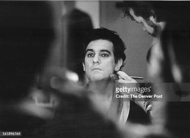 Make-up artist Bruce Geller applies make up to Placido Domingo Sat. Afternoon in his dressing room, before going on stage for a dress rehearsal.;