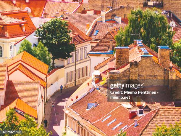 rooftops in the old town of vilnius, lithuania - vilnius stock pictures, royalty-free photos & images