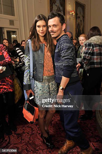 Designer Matthew Williamson and Sarah Ann Macklin attend the Matthew Williamson show during London Fashion Week Fall/Winter 2013/14 at on February...