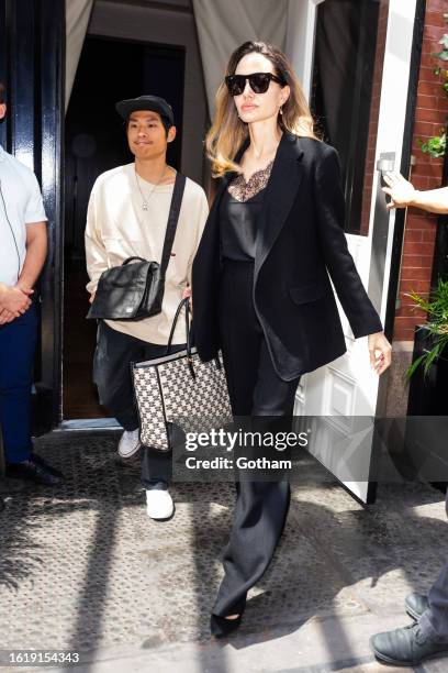 Pax Jolie-Pitt and Angelina Jolie are seen in SoHo on August 16, 2023 in New York City.