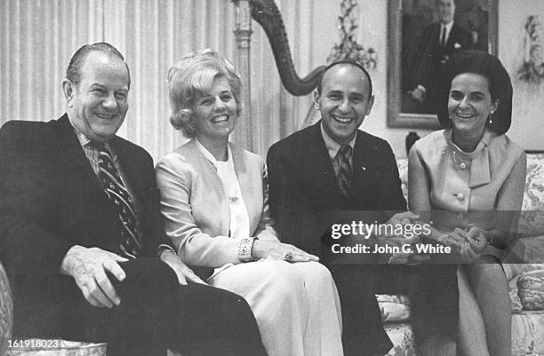 Astronaut and Wife are summer Houseguests; Capt. And Mrs. Alan Bean of Houston Chat with their hosts, Mr. And Mrs. Franklin burns of Cherry Hills...