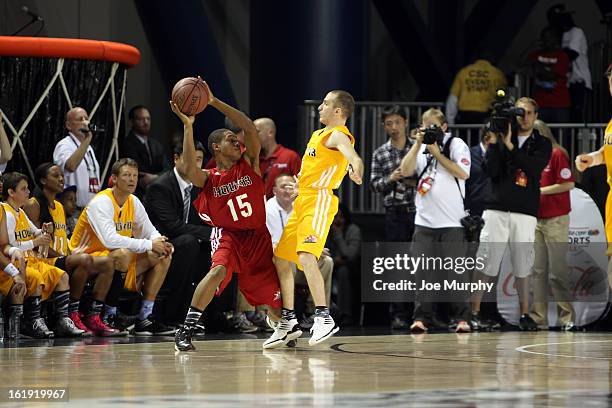 The East team controls the ball during the NBA Cares Special Olympics Unity Sports Basketball Game on Center Court during the 2013 NBA Jam Session on...