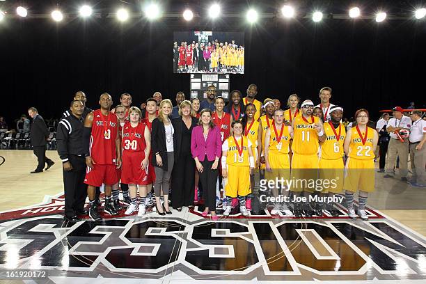 The East and West teams pose for a photo after the NBA Cares Special Olympics Unity Sports Basketball Game on Center Court during the 2013 NBA Jam...
