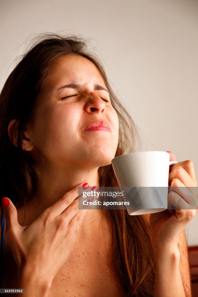 Young woman with sore throat