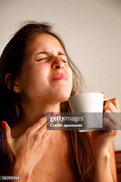 young woman with sore throat - throat pain stock pictures, royalty-free photos & images