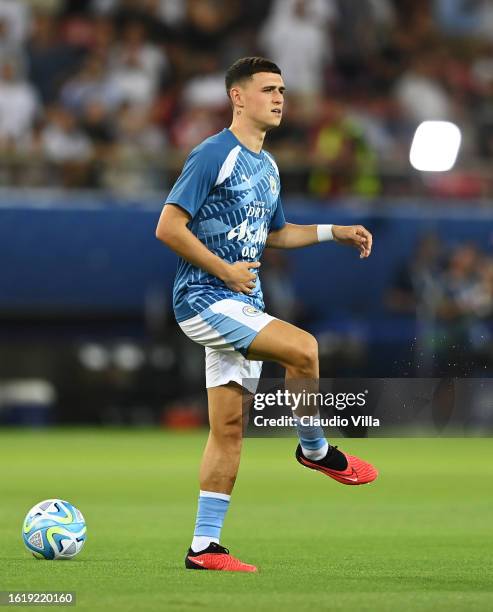 Phil Foden of Manchester City warms up prior to the UEFA Super Cup 2023 match between Manchester City FC and Sevilla FC at Karaiskakis Stadium on...