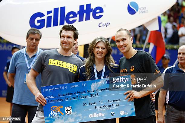 Alexander Peya from Austria and Bruno Soares from Brasil pose for a photo after winning the double final match against Frantisek Cermak from Czech...