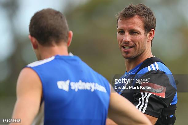 Lucas Neill speaks to a team mate during a Sydney FC A-League training session at Macquarie Uni on February 18, 2013 in Sydney, Australia.