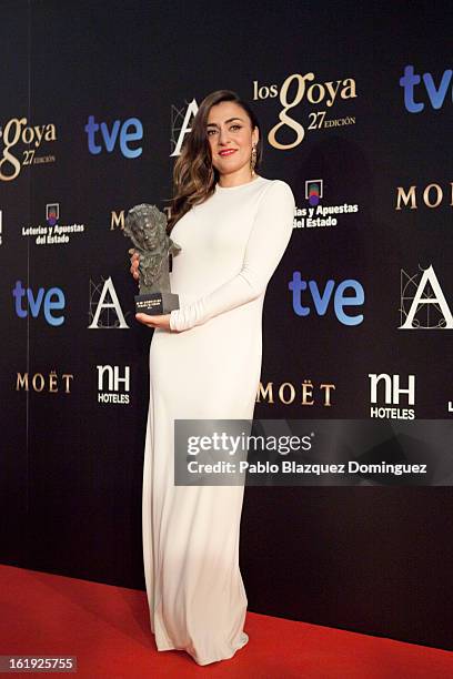 Candela Pena holds the award for Best Actress in Supporting Role in the film 'Una pistola en cada Mano' during the 2013 edition of the 'Goya Cinema...