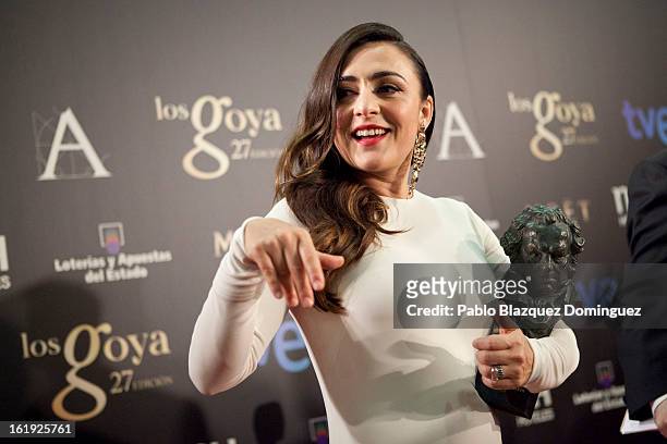 Candela Pena holds the award for Best Actress in Supporting Role in the film 'Una pistola en cada Mano' during the 2013 edition of the 'Goya Cinema...