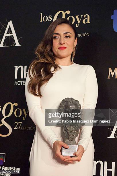 Candela Pena holds the award for Best Actress in Supporting Role in the film 'Una pistola en cada Mano' during the 2013 edition of the 'Goya Cinema...