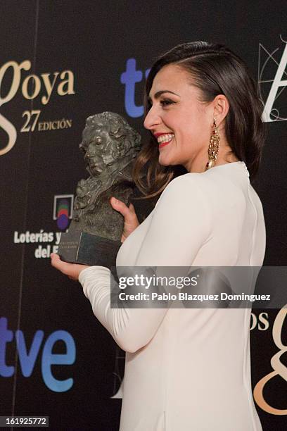 Candela Pena holds the award for Best Actress in Supporting Role in the film 'Una pistola en cada Mano' during the 2013 edition of the 'Goya Cinema...