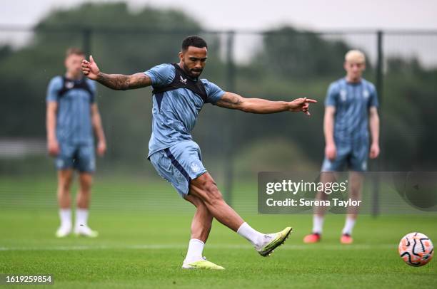 Callum Wilson strikes the ball during the Newcastle United Training Session at the Newcastle United Training Centre on August 16, 2023 in Newcastle...