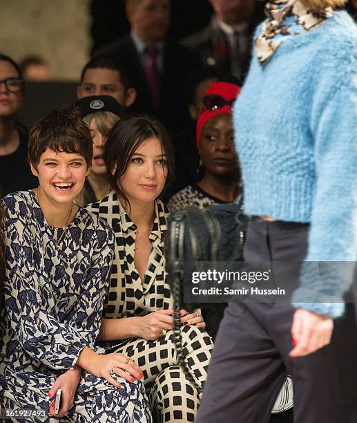Pixie Geldof and Daisy Lowe attend the Topshop Unique show at the Tate Modern during London Fashion Week Fall/Winter 2013/14 on February 17, 2013 in...