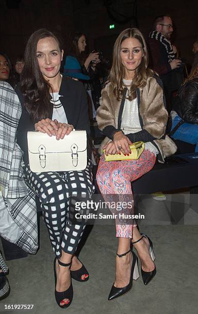 Victoria Pendleton and Olivia Palermo attend the Topshop Unique show at the Tate Modern during London Fashion Week Fall/Winter 2013/14 on February...