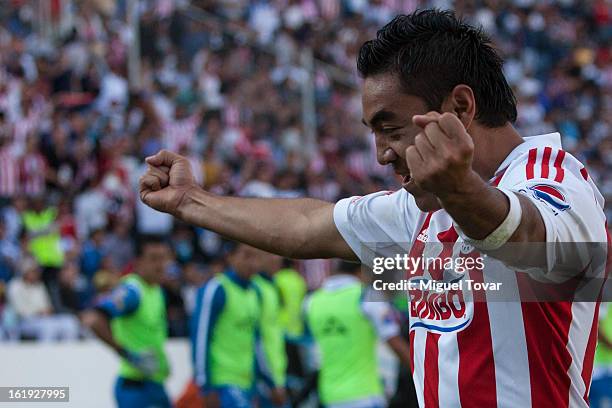 Marco Fabian of Chivas celebrates after scoring during a match between Puebla and Chivas as part of the Clausura 2013 at Cuauhtemoc Stadium on...