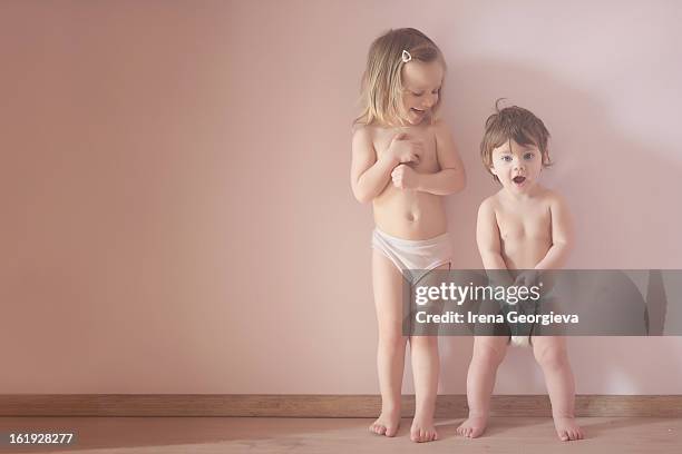 sisters - kids in undies stockfoto's en -beelden