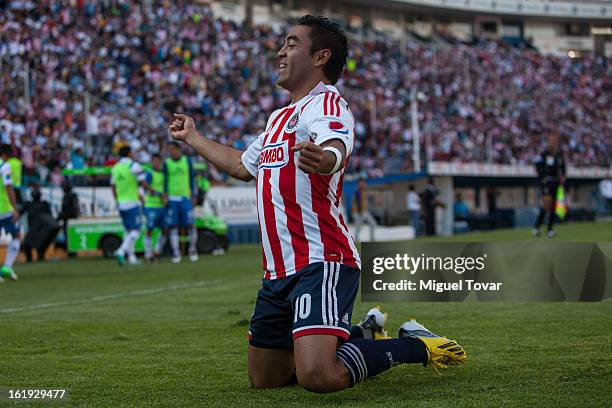 Marco Fabian of Chivas celebrates after scoring during a match between Puebla and Chivas as part of the Clausura 2013 at Cuauhtemoc Stadium on...