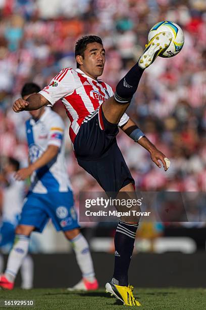 Marco Fabian of Chivas controls the ball during a match between Puebla and Chivas as part of the Clausura 2013 at Cuauhtemoc Stadium on February 17,...