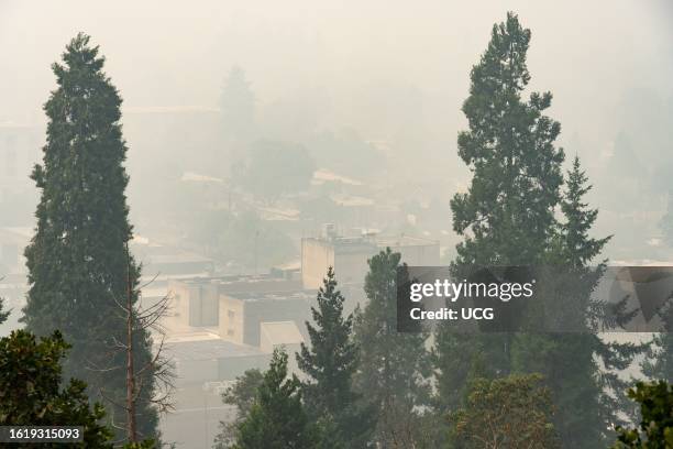 Smoky air due to forest fire and buildings, Eugene, Oregon.